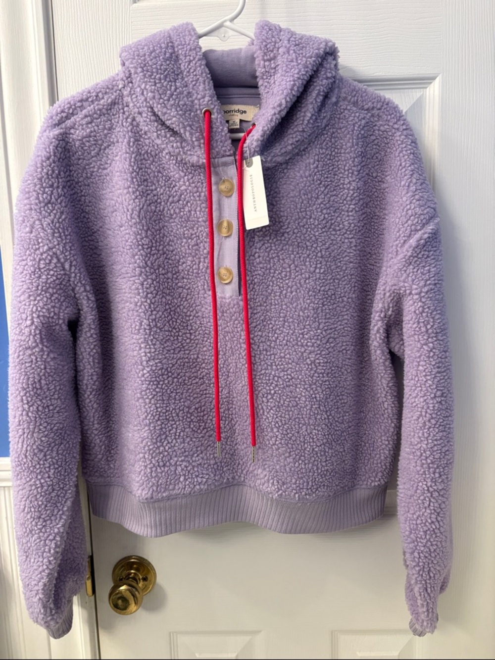 Lavender Sherpa Hoodie with Red Drawcords by Porridge sold at Anthropologie